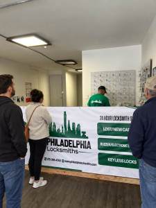 Philadelphia Locksmiths store front with customers in Philadelphia PA
